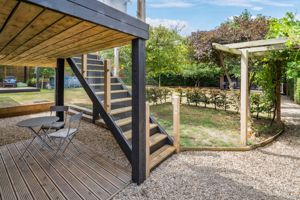 Stairs to raised deck area- click for photo gallery